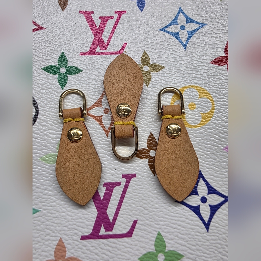 Louis Vuitton Beige Leather Zipper Pulls with Gold Accents